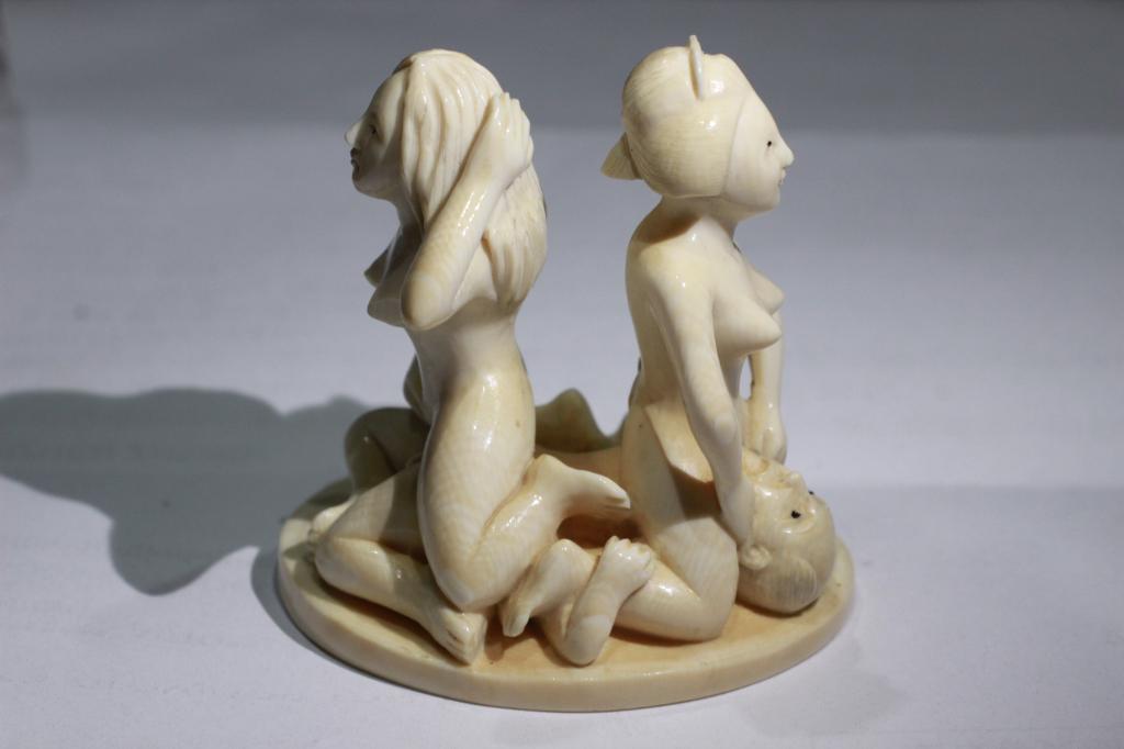 Japanese Erotic Subject Bone Carved Netsuke: 6.0cm H by 6.0cm W. Please note the absence of a condition report does not imply that there are no condition issues with this lot. Please contact us for a detailed condition report.