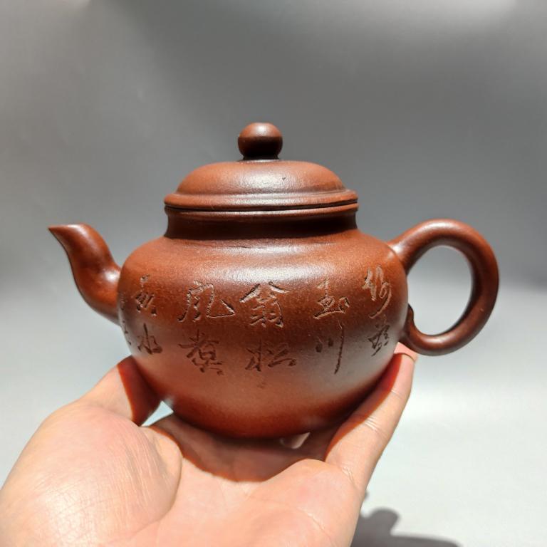 Chinese Zisha Teapot w Calligraphy,Mark: 400cc Please note the absence of a condition report does not imply that there are no condition issues with this lot. Please contact us for a detailed condition report.