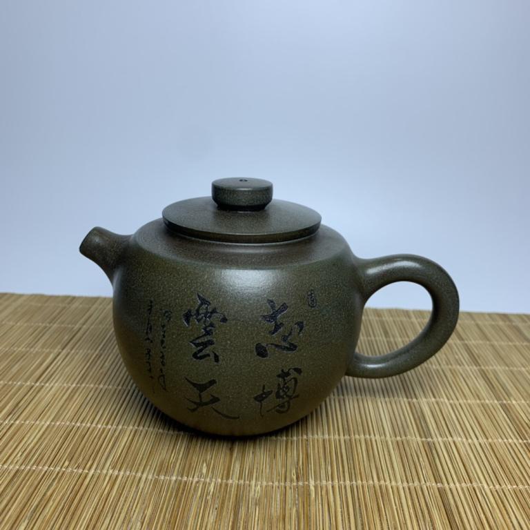 Chinese Zisha Teapot: 14.5cm L 9.5cm H Please note the absence of a condition report does not imply that there are no condition issues with this lot. Please contact us for a detailed condition report.
