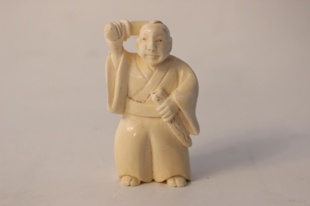 Japanese Bone Carved Netsuke: 5cm H Please note the absence of a condition report does not imply that there are no condition issues with this lot. Please contact us for a detailed condition report.