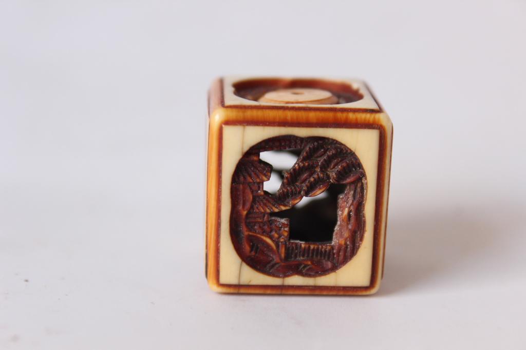 Signed, Bone Carved Dice: 1" W Please note the absence of a condition report does not imply that there are no condition issues with this lot. Please contact us for a detailed condition report.