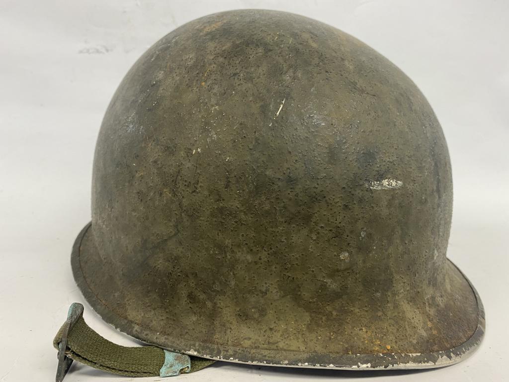 WWII Military Helmet: WWII Helmet Please note the absence of a condition report does not imply that there are no condition issues with this lot. Please contact us for a detailed condition report.