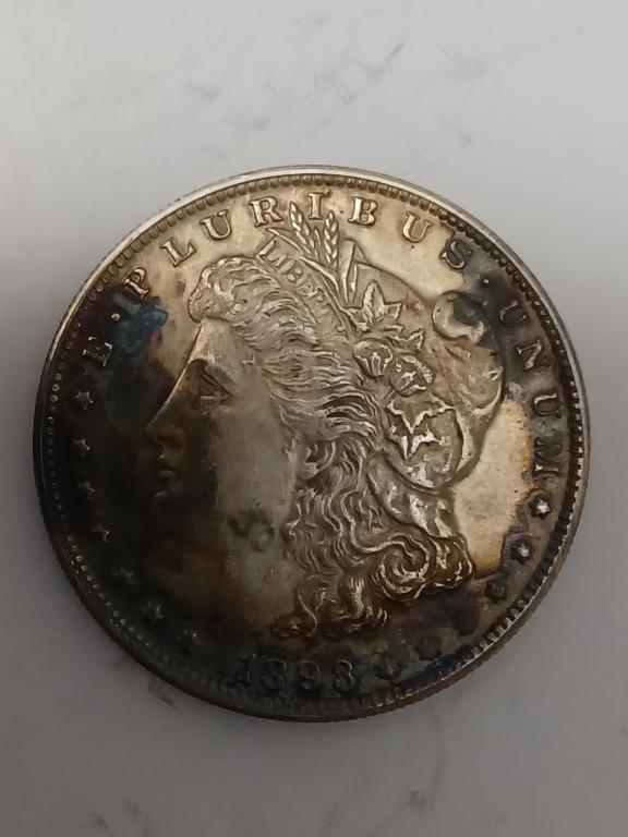 1893 Morgan Silver Dollar: 1893 Morgan Silver Dollar Please note the absence of a condition report does not imply that there are no condition issues with this lot. Please contact us for a detailed condition report.