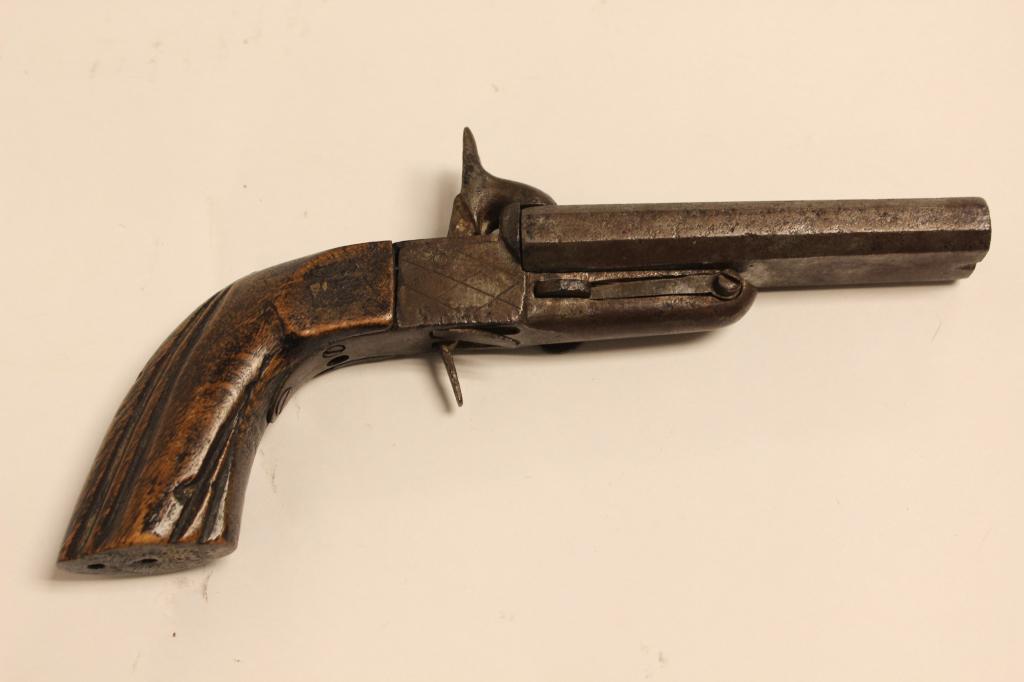 Antique Miniture Gun: 8 1/4" L Please note the absence of a condition report does not imply that there are no condition issues with this lot. Please contact us for a detailed condition report.