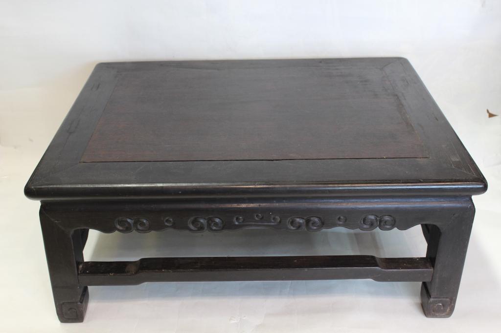 Chinese Wood Coffee Table: 18 1/2" by 24 1/2" Please note the absence of a condition report does not imply that there are no condition issues with this lot. Please contact us for a detailed condition report.