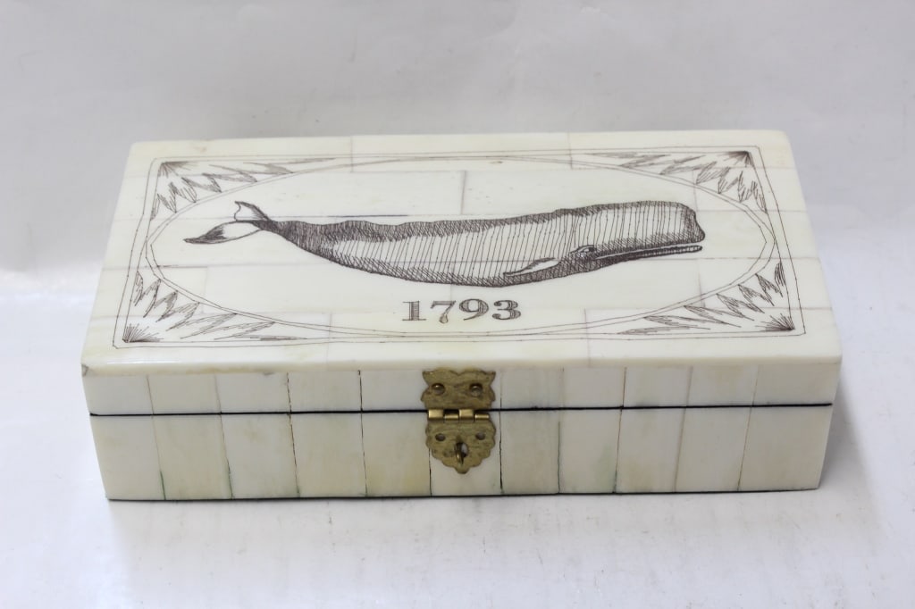 American Bone Jewelry Case w Whale: 6" by 3" Please note the absence of a condition report does not imply that there are no condition issues with this lot. Please contact us for a detailed condition report.