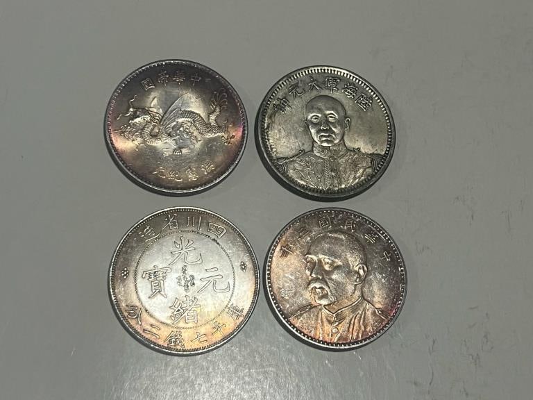 Four Chinese Coins: Four Chinese Coins Please note the absence of a condition report does not imply that there are no condition issues with this lot. Please contact us for a detailed condition report.