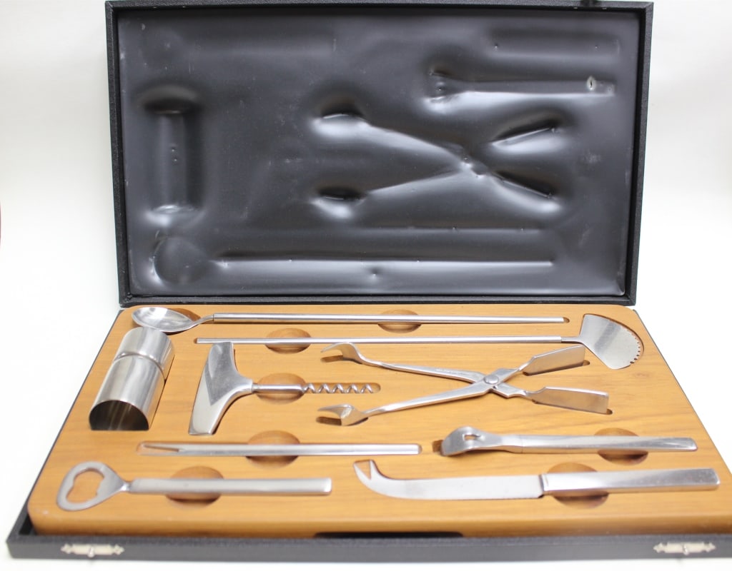 Georg Jensen Stainless Steel Wine Set: Georg Jensen Stainless Steel Wine Set Please note the absence of a condition report does not imply that there are no condition issues with this lot. Please contact us for a detailed condition re