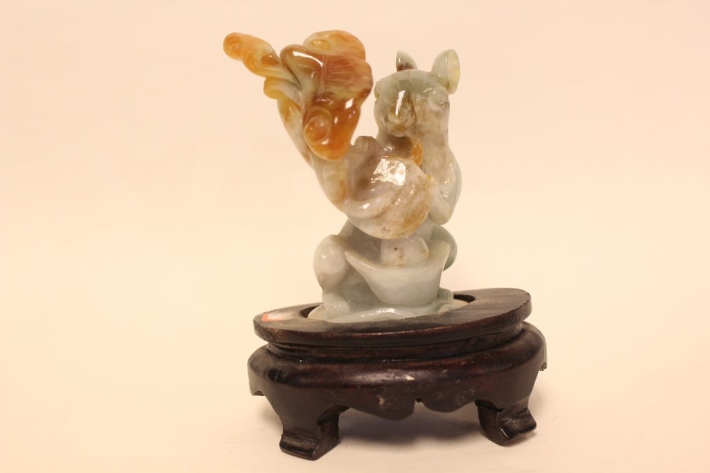 A Jadeite Carved Rabbit: A Jadeite Carved Rabbit . 4 3/4' H Provenance: From a New York private collector Please note the absence of a condition report does not imply that there are no condition issues with this lot. Please c