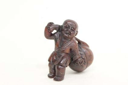 Chinese Carved Boy Carrying a Peach
