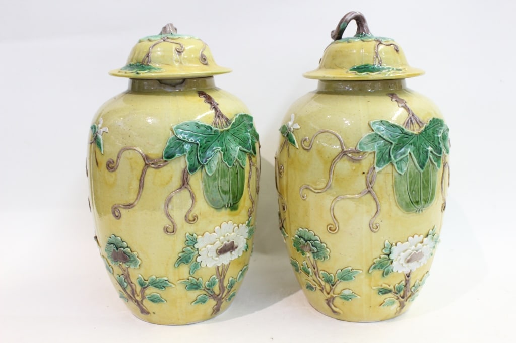 Pair of Chinese Yellow Ground Lid Vases: Pair of Chinese Yellow Ground Lid Vases . Condition: Sold as is. (see pictures) one vase has a damage from the rim and one damage on the cover. From a Long Island, New York Townhouse
