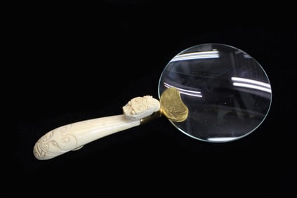 Antique Chinese magnifying glass with figural hand