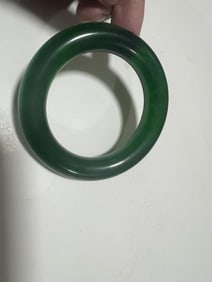 A Green Jadeite Bangle