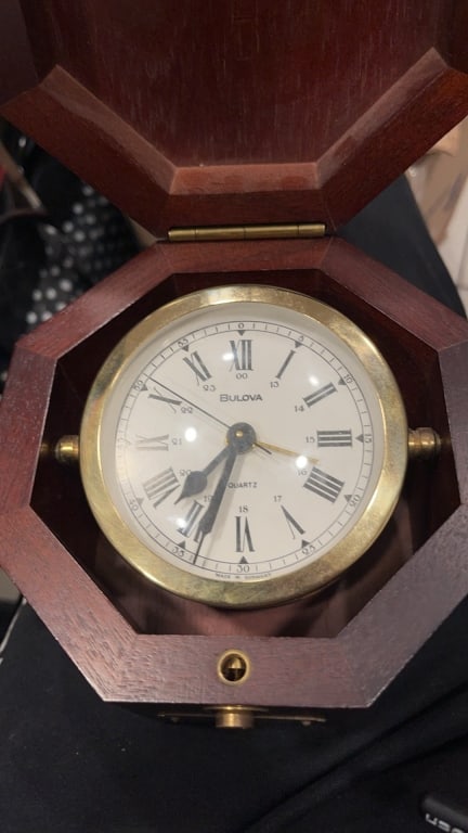 Bulova Quartermaster Maritime Desk Clock in O: Bulova Quartermaster Maritime Desk Clock in Octogonal Mahogany wood display. . Working condition