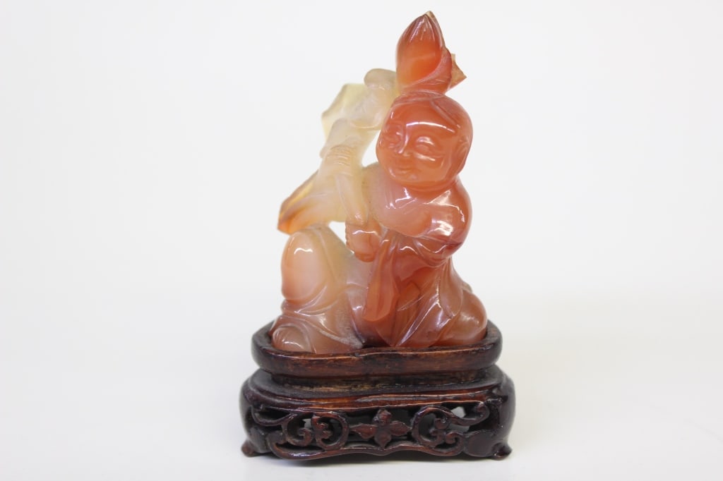A Carved Agate Figural: A Carved Agate Figural Dimension: 3" H
