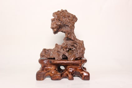 A Small Scholar Rock Stone on Wood Stand