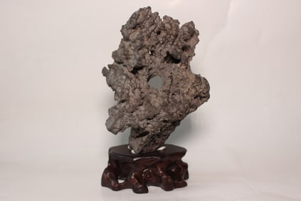 A Small Scholar Rock Stone on Wood Stand