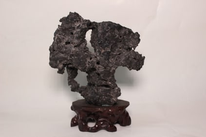 A Small Scholar Rock Stone on Wood Stand