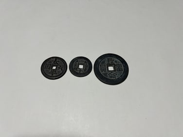 Three Chinese Coins