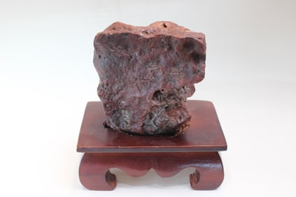 A Scholar Rock Stone on Wood Stand