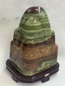 A Scholar Rock Stone on Wood Stand
