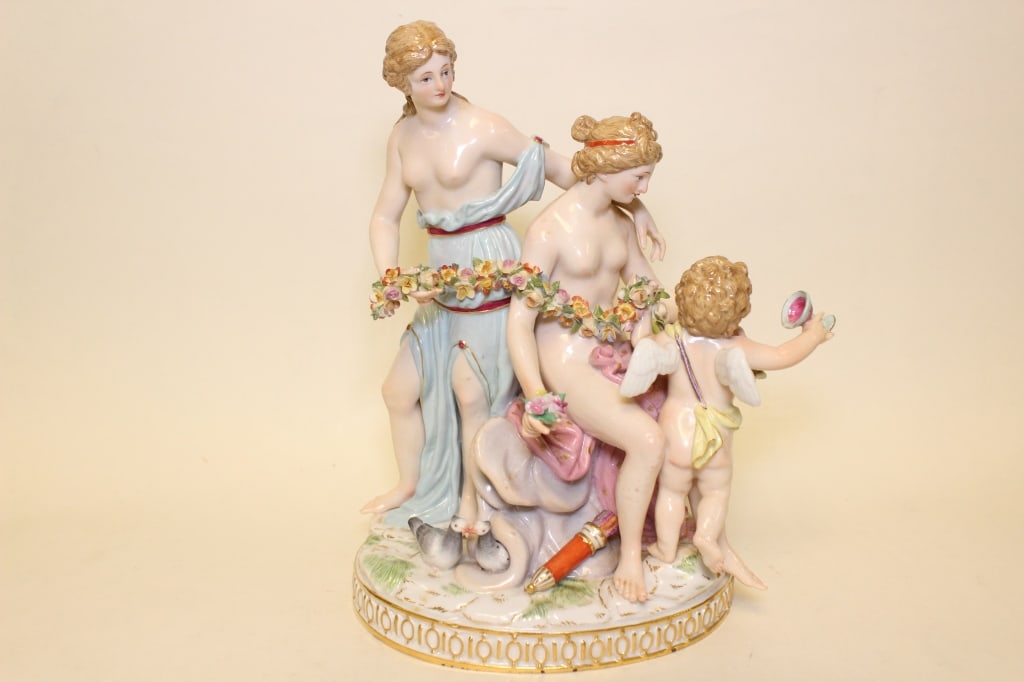 19th.C Meissen Porcelain Figural Group of SemiNude: 19th.C Meissen Porcelain Figural Group of Semi-Nude girl and cupid holding cup. underglaze blue crossed swords mark. Dimension:8" H