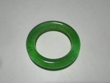 A Green Jadeite Bangle