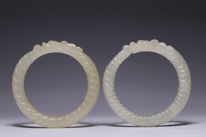Two Chinese Jade Kesa Rings