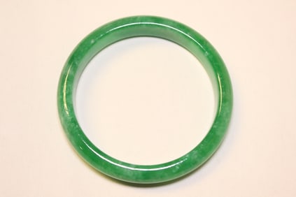 A Green Jadeite Bangle
