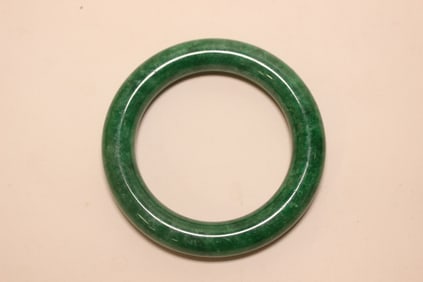 A Green Jadeite Bangle