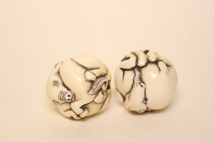 Two Japanese Hand Carved Bone Ball Shape Beads