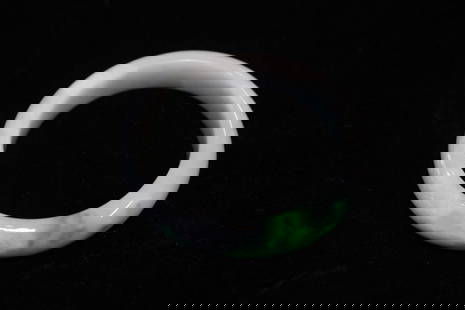 A Jadeite Bangle: A Jadeite Bangle