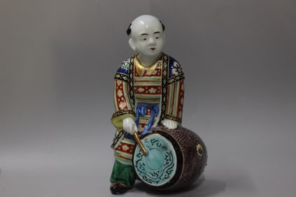 Japanese Porcelain Figurine Playing Drums