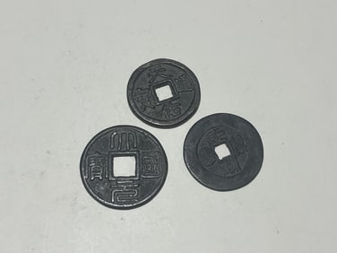 Three Chinese Coins