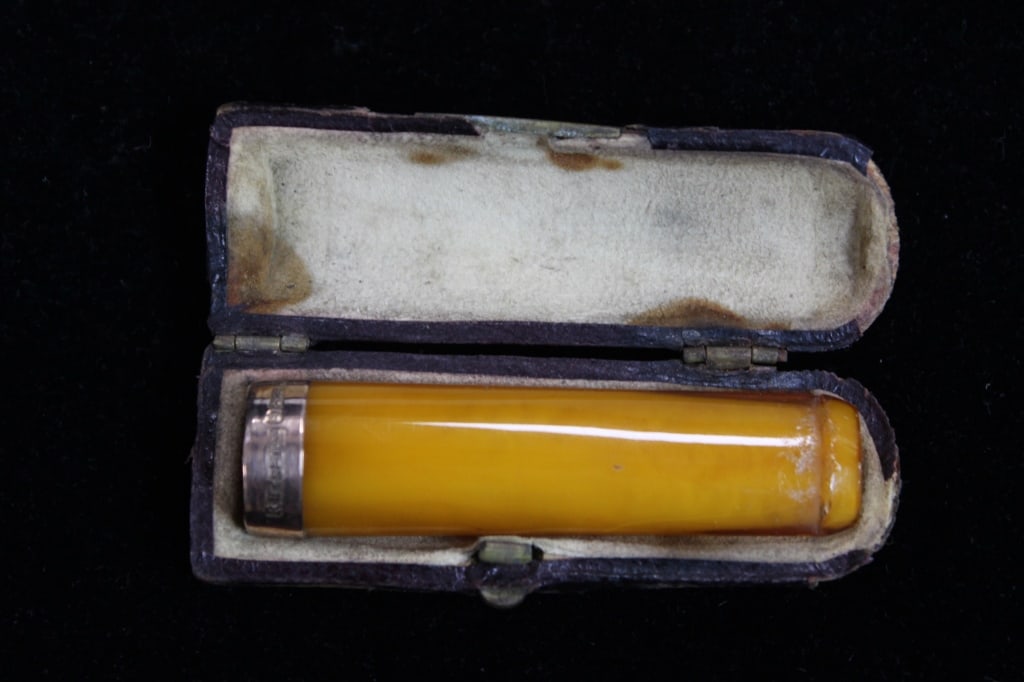 Antique Yellow Amber Cigar Holder: Antique Yellow Amber Cigar Holder, The hallmarks stamped on the band Dimension: 2 1/2"L.