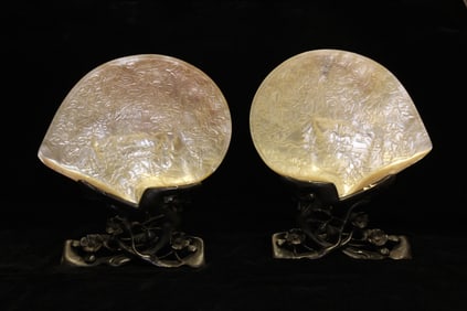 Pair of Large Carved Mother-of-Pearl Display Shells with wooden bases.