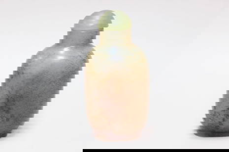 Chinese Jade Snuff Bottle: The bottle has a rounded, flattened shape with a short neck and is topped with a smooth, green jade stopper.Dimension:2 3/4"H.The bottle has a compressed, oval form, a classic shape for snuff bottles,