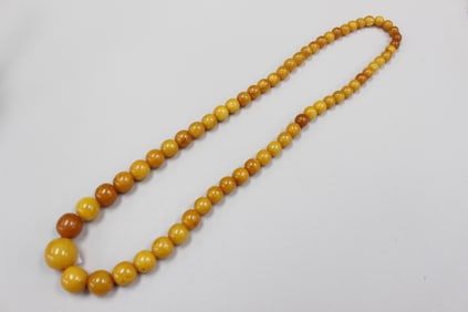 An Amber beaded necklace