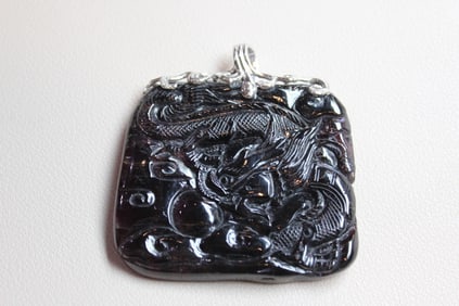 A Carved Tourmaline Gemstone Pendant