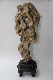 A Scholar Taihu Rock Stone on Wood Stand