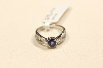 Oval-cut Blue Spinel Platinum Ring