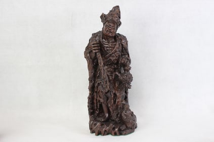 Chinese wood carving of an immortal