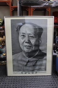 framed black and white portrait of Mao Zedong