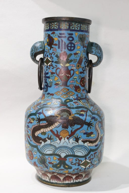 Chinese Cloisonné Enamel Vase: Chinese cloisonné enamel vase, richly decorated and likely dating to the late Qing dynasty (19th–early 20th century). Dimension: 11 1/2"H Baluster-shaped body with a gently rounded shoulder and sli