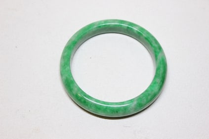 A Green Jadeite Bangle