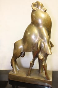 Bronze Abstract Sculpture of a baboon mother carrying her young on her back.