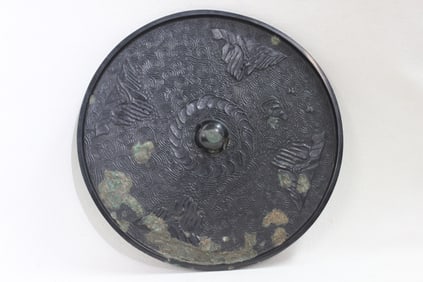 Chinese Bronze mirror with a high-relief design
