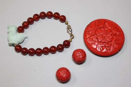 Two Cinnerbar Beads and A Bracelet w Jadeite Toggle