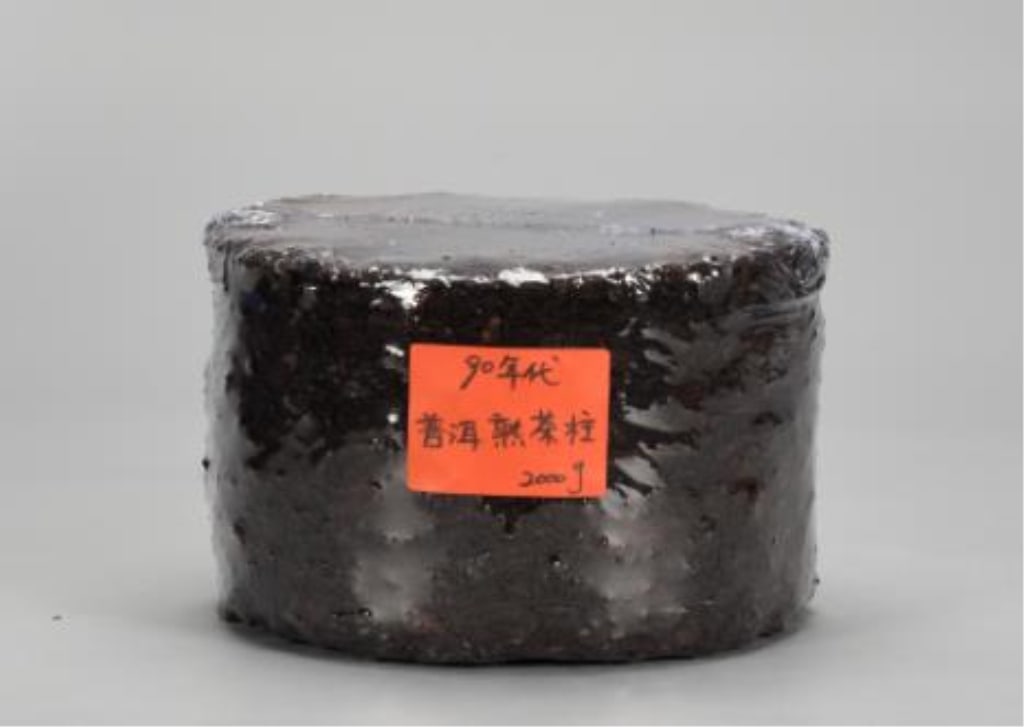 1990s Compressed Ripe Pu-erh Tea: Dimension: 2000g Teas from this era that have been stored well are considered highly valuable and are praised for developing complex flavors with notes of dried jujube, spices, and musk, lacking