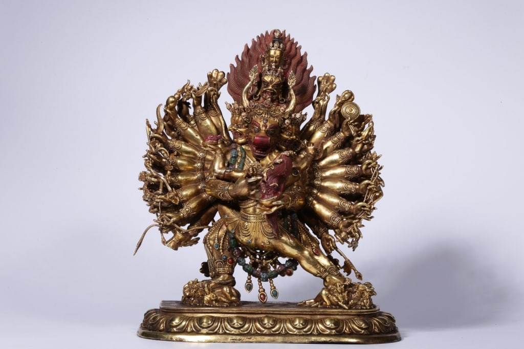 Chinese Gilt Bronze Vajrabhairava Buddha: Dimension: 25cm H x 21 x 10cm,weight is 4263gram.Yamantaka (also known as Vajrabhairava), a powerful and wrathful deity in Tibetan Buddhism considered to be the "Conqueror of Death". He is a fierce